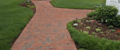 S&H Boston City Hall Brick Paver with a classic red hue and textured surface, designed to replicate the historic look of Boston's cityscape, ideal for traditional and timeless outdoor pathways and patios.