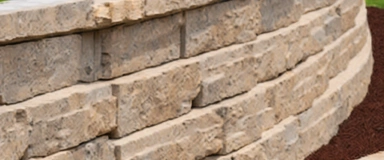 Estate Retaining Walls constructed with robust and aesthetically pleasing blocks, providing both structural support and an elegant appearance for terraced landscapes and garden borders